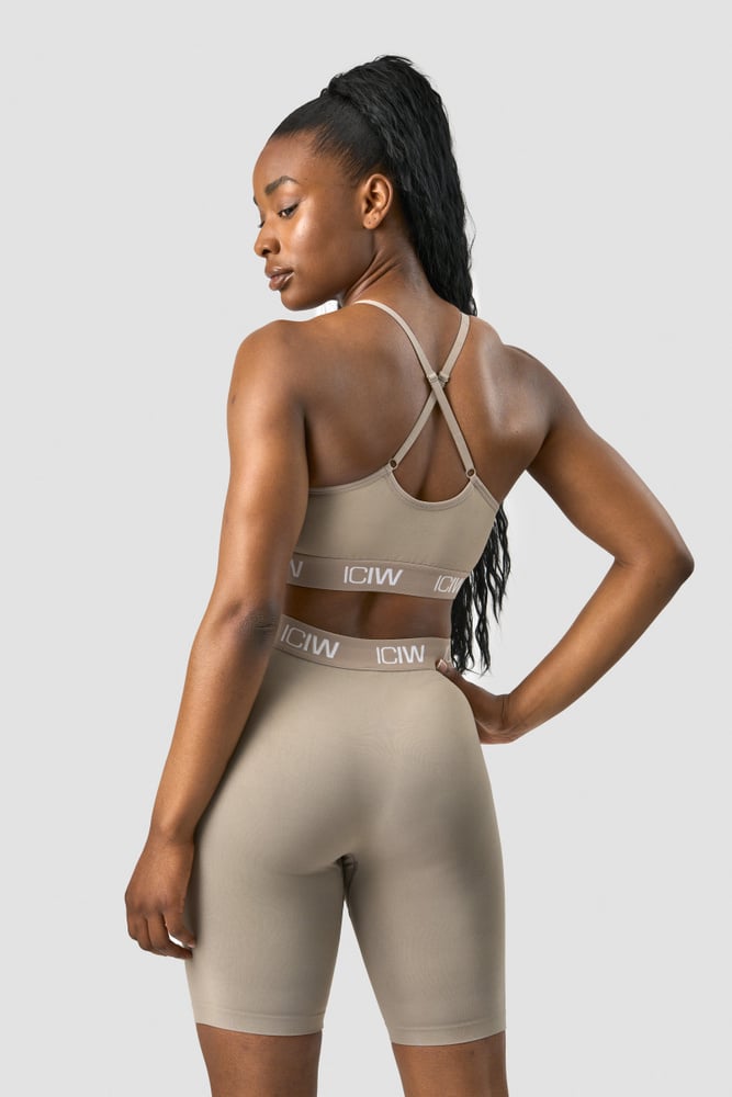 define seamless logo strappy sports bra taupe