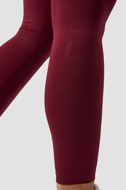 define seamless tights burgundy