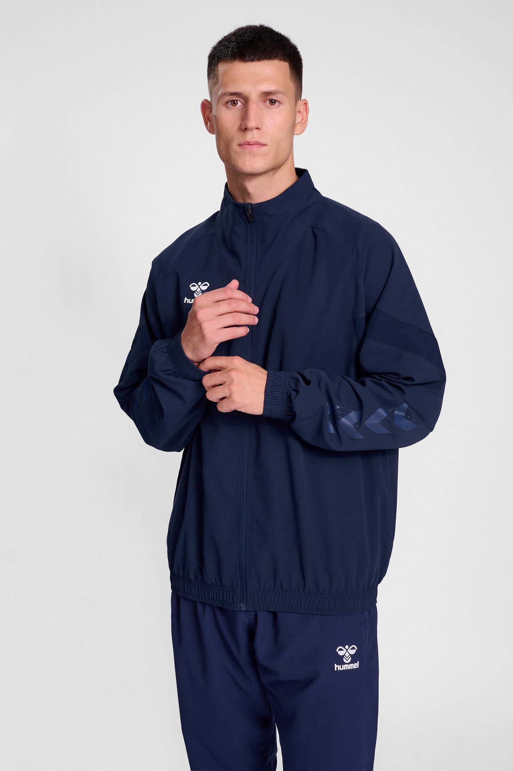 HUMMEL - Hmltravel Woven Jacket - Marine