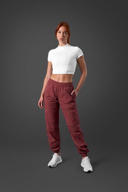 reboot pants brick red